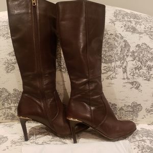 Brown leather coach boots with gold detail